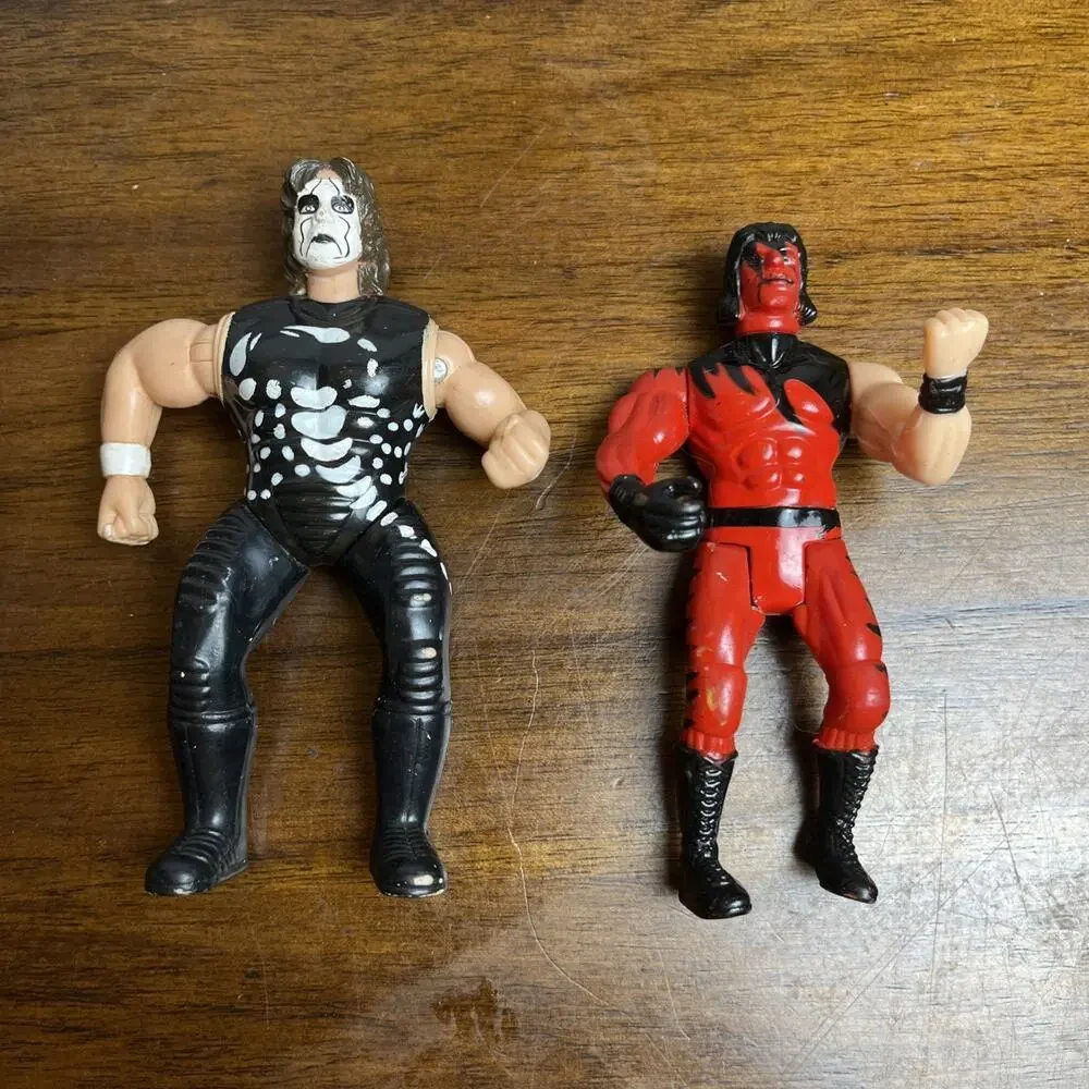Two (2) 1990s Wrestling Figures. Used As-Is. Moveable Arms And Legs. WWE Style